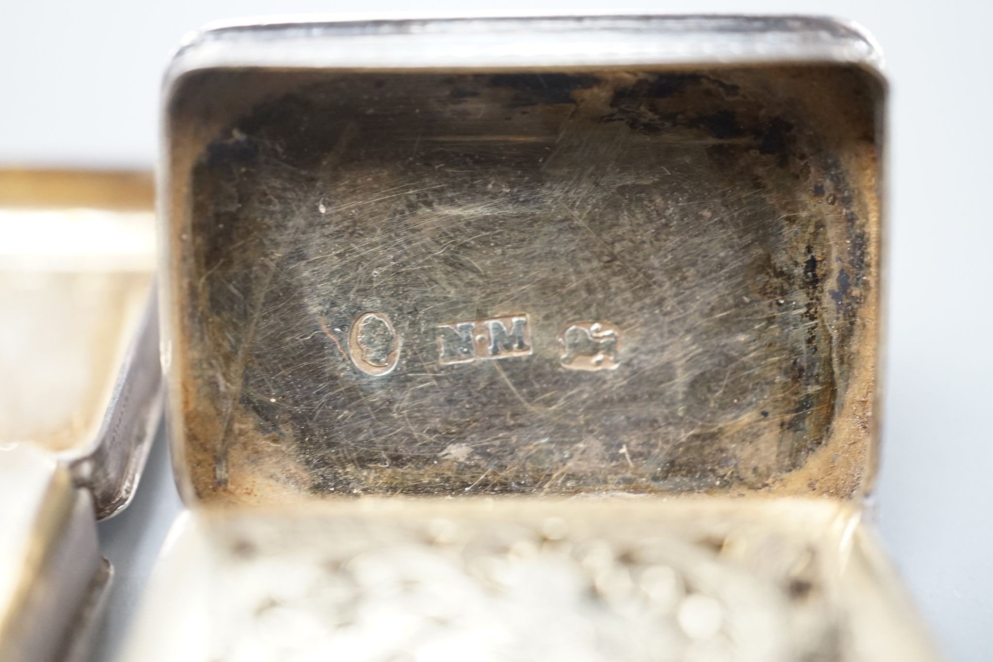 A George IV engraved silver rectangular vinaigrette, by Nathaniel Mills, Birmingham, 1827, engraved 'Celia', 31mm and a later vinaigrette, Birmingham, 1833.